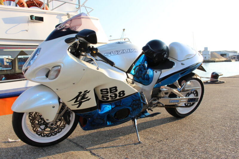 Suzuki coated in skulls painted blue