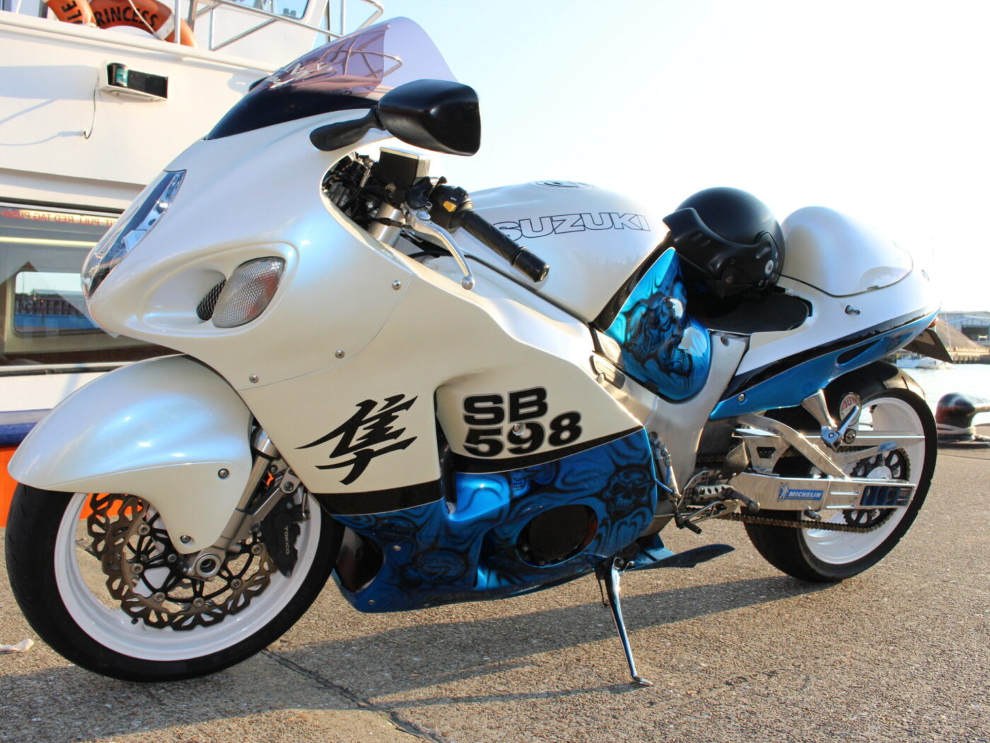 Suzuki coated in skulls painted blue