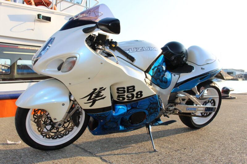 Suzuki coated in skulls painted blue