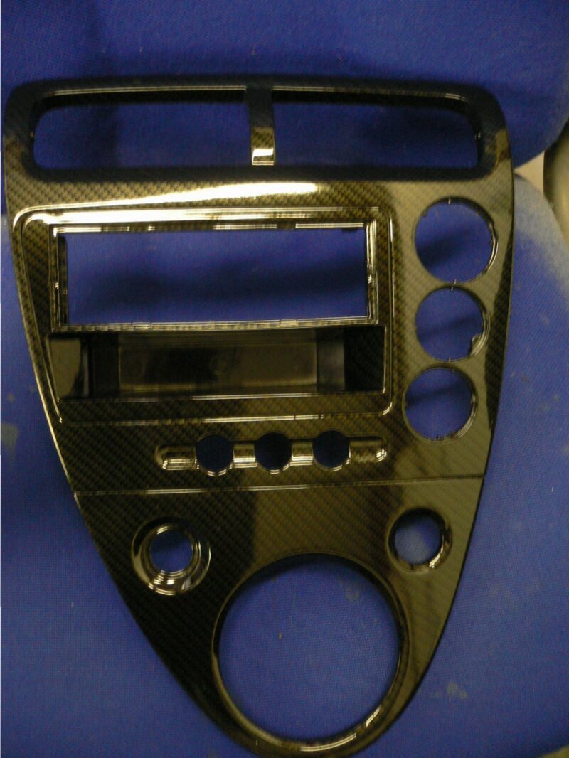 Car interior various elements coated in carbon fibre hydrographic film painted black