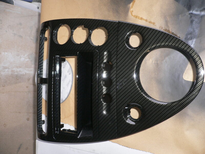 Car interior various elements coated in carbon fibre hydrographic film painted black