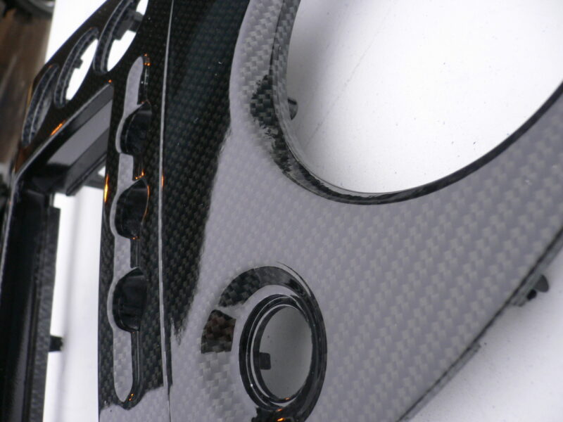 Car interior various elements coated in carbon fibre hydrographic film painted black