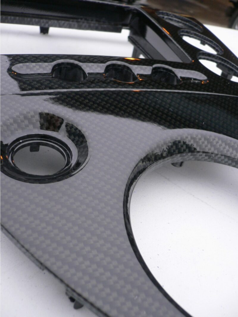 Car interior various elements coated in carbon fibre hydrographic film painted black