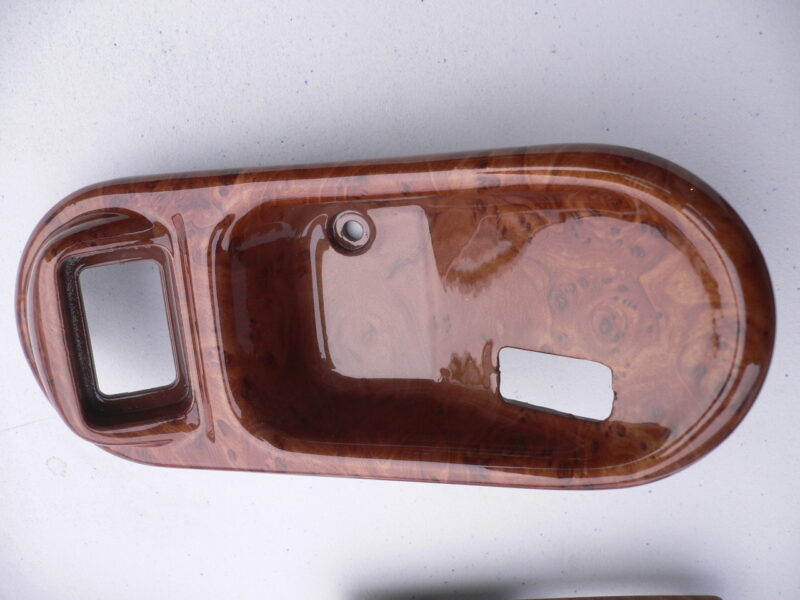 Various car interior elements coated in wood hydrographic film