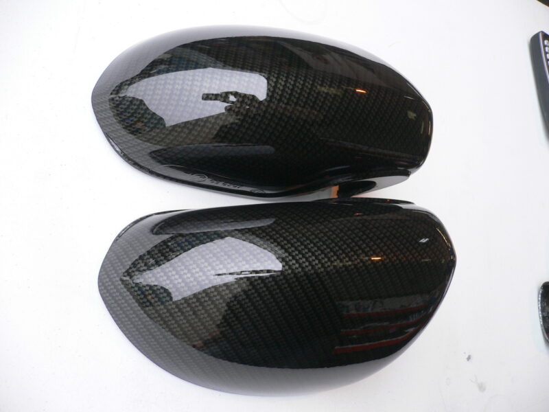 Car mirrors cover coated in carbon fibre hydrographic film painted black