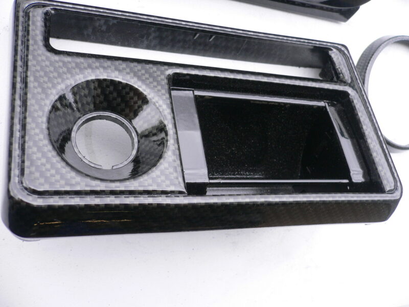 Car interior various elements coated in carbon fibre hydrographic film painted black