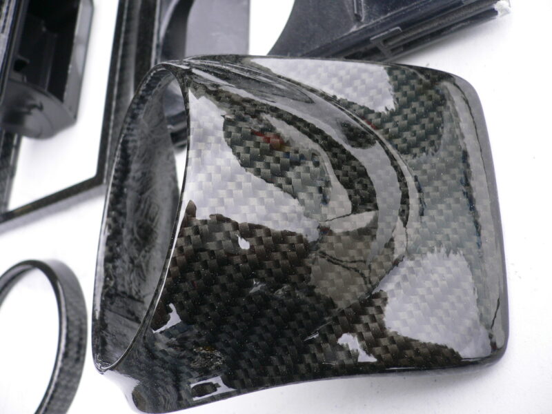 Car interior various elements coated in carbon fibre hydrographic film painted black