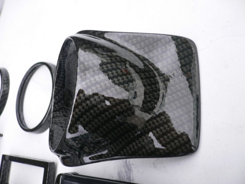 Car interior various elements coated in carbon fibre hydrographic film painted black