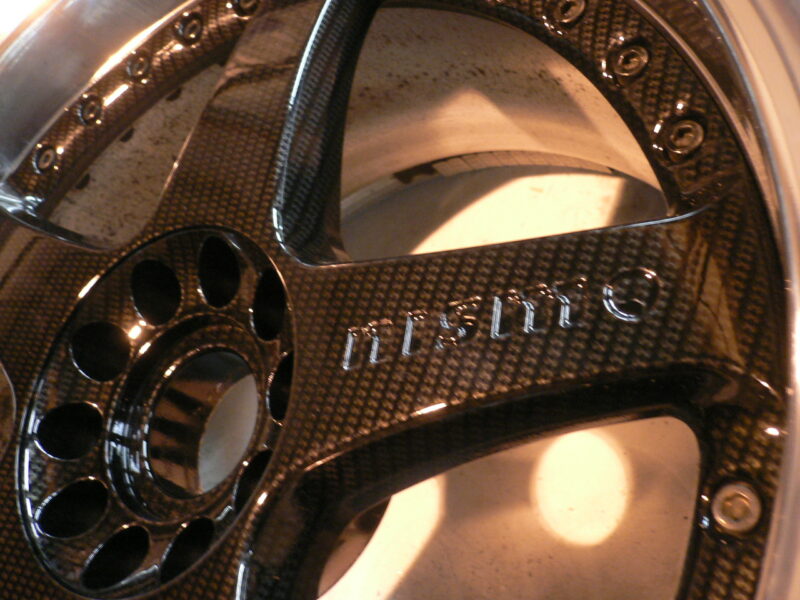 Nismo alloy wheels coated in carbon fibre