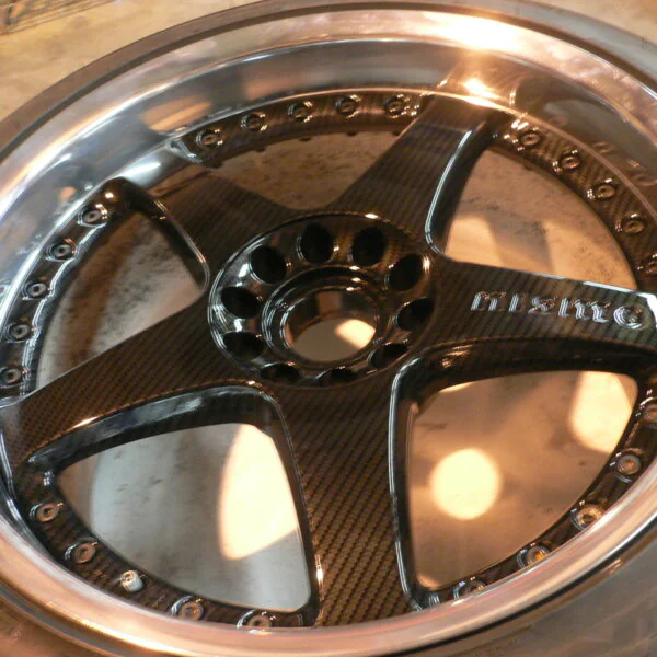 Nismo alloy wheels coated in carbon fibre