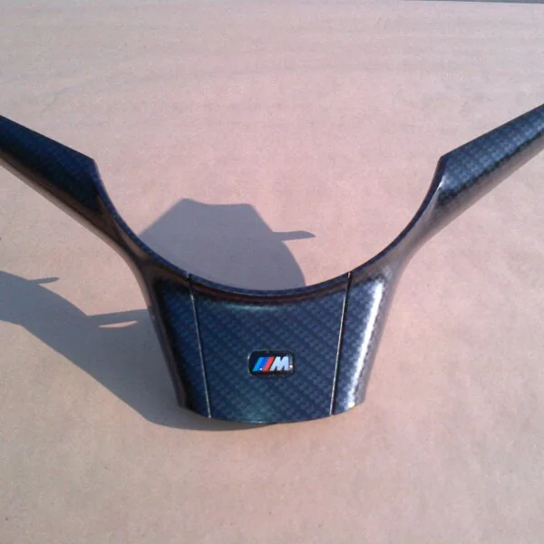 Parts of car interior coated in carbon fibre