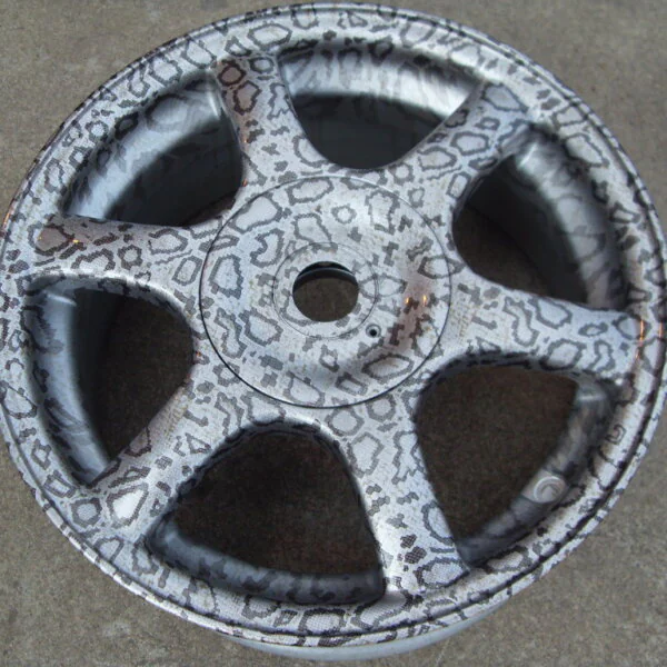 Car alloy wheels coated in panther hydrographic film