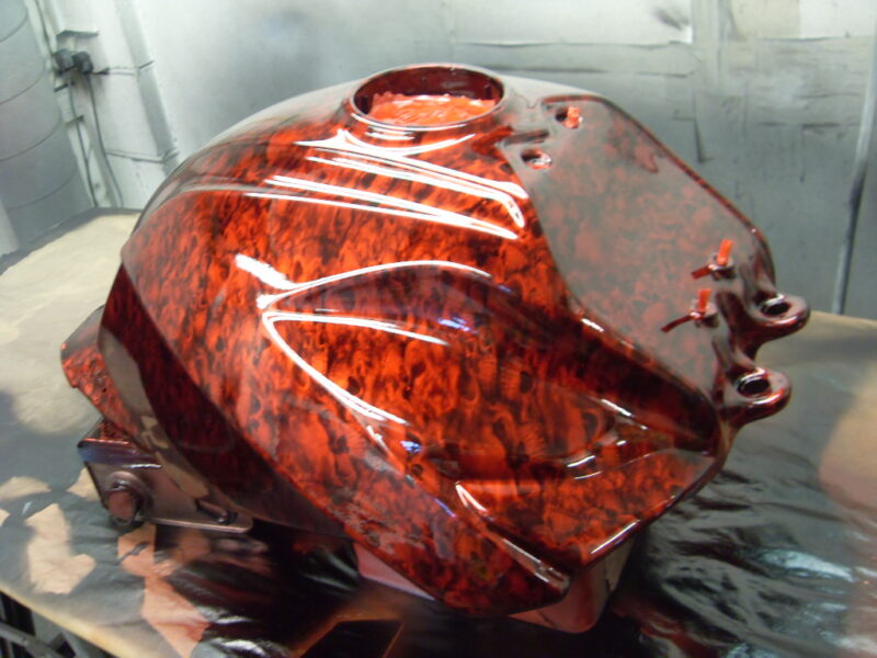 Motorbike Tank Coated In Skull Hydrographic Film Painted Red