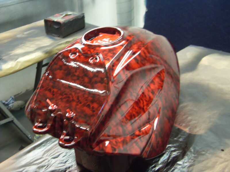 Motorbike Tank Coated In Skull Hydrographic Film Painted Red