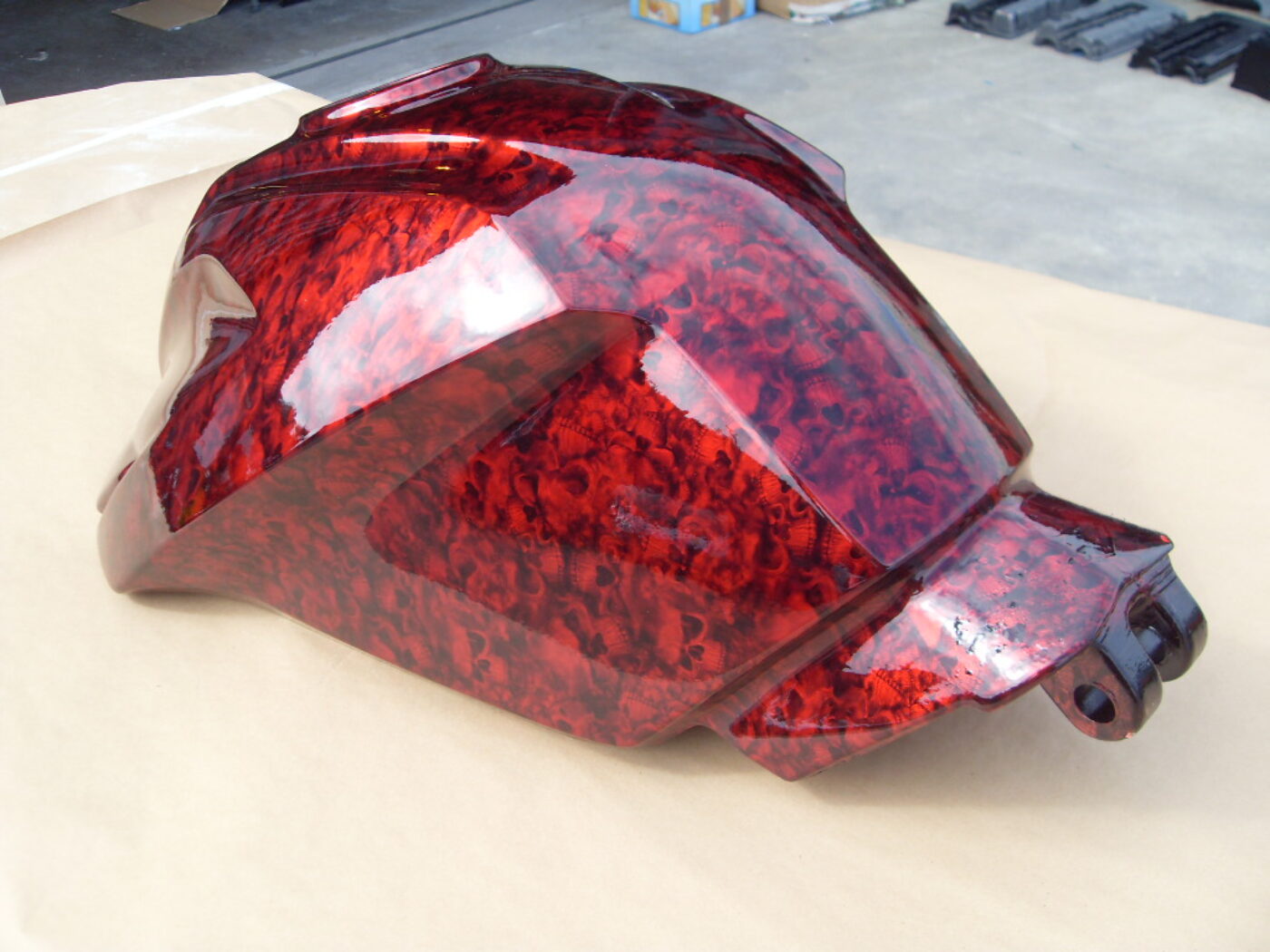 Motorbike Tank Coated In Skull Hydrographic Film Painted Red