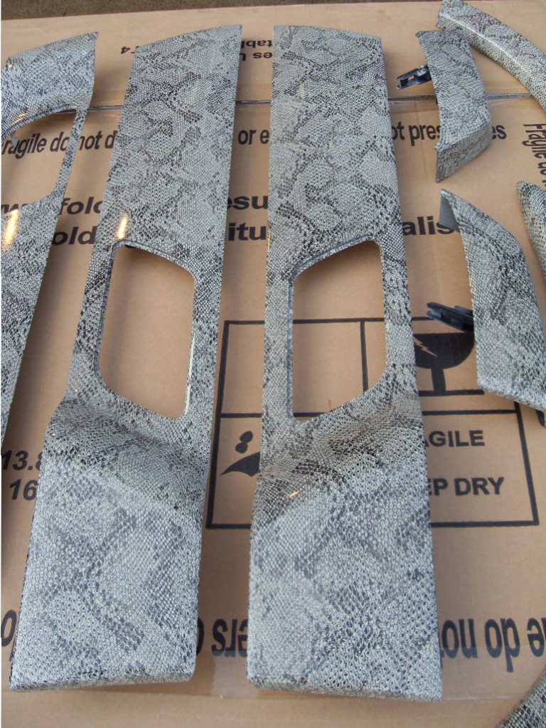 Car Interior Elements Coated In Snake Hydrographic Film