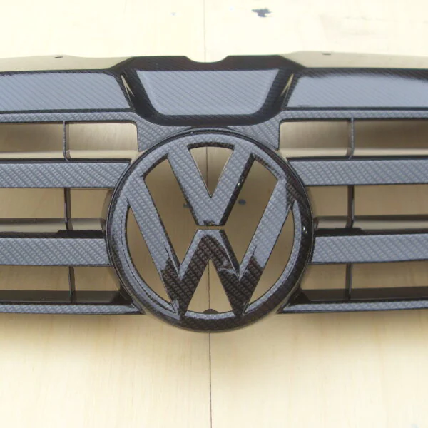 VW radiator cover coated in carbon fibre hydrographic film painted black