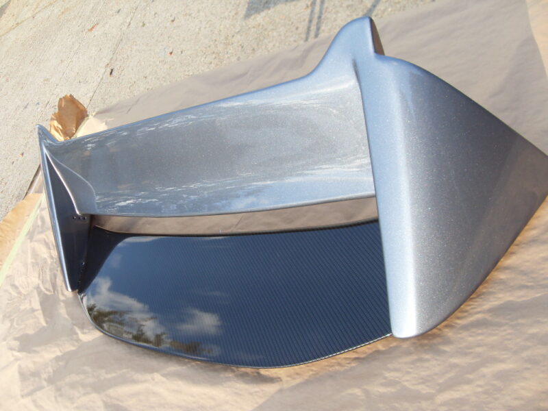 Car exterior parts coated in carbon fibre painted silver
