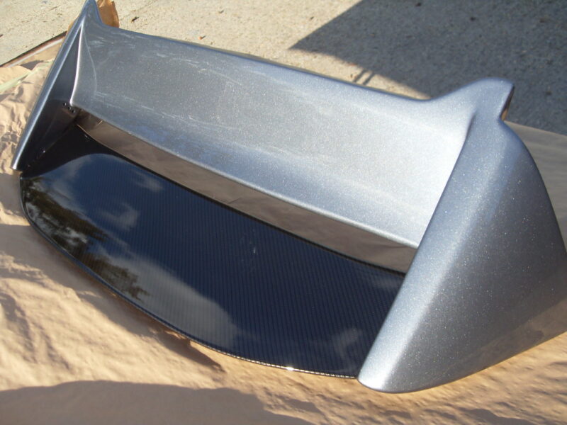 Car exterior parts coated in carbon fibre painted silver