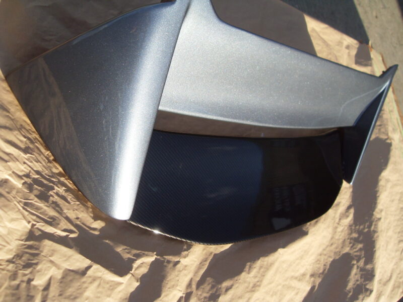 Car exterior parts coated in carbon fibre painted silver