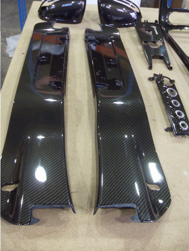 Car interior various parts coated in carbon fibre hydrographic film painted black