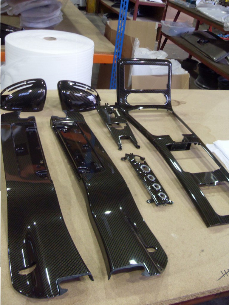 Car interior various parts coated in carbon fibre hydrographic film painted black