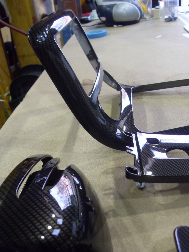 Car interior various parts coated in carbon fibre hydrographic film painted black