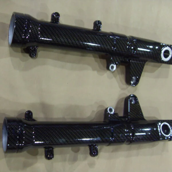 Motorbike parts coated in carbon fibre hydrographic film painted black