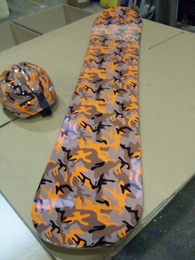 Snowboard And Protective Helmet Coated On Camouflage Hydrographic Film