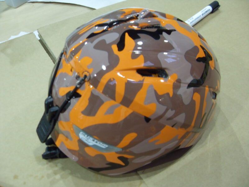 Snowboard And Protective Helmet Coated On Camouflage Hydrographic Film
