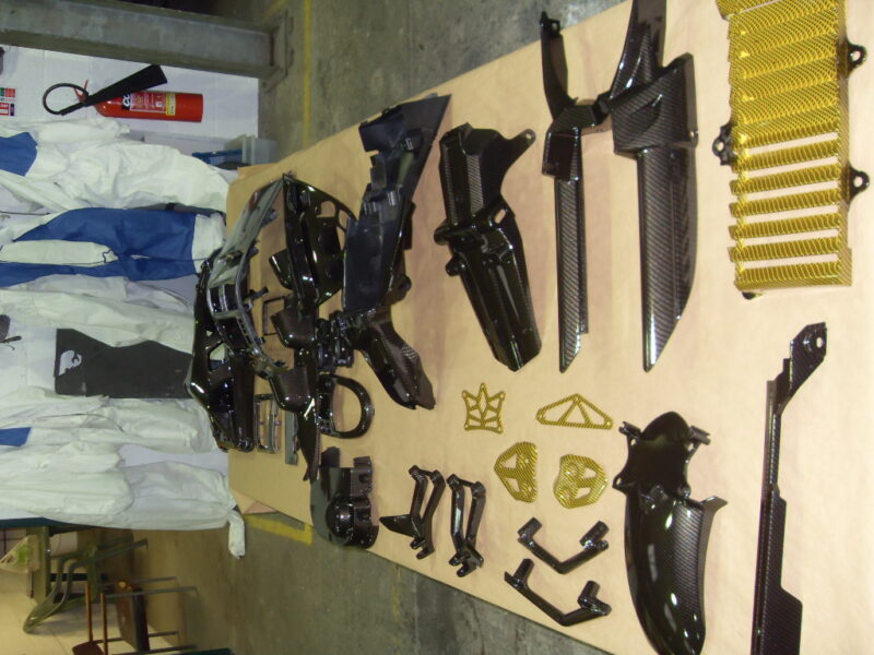 Motorbike various parts coated in carbon fibre hydrographic film painted black and yellow