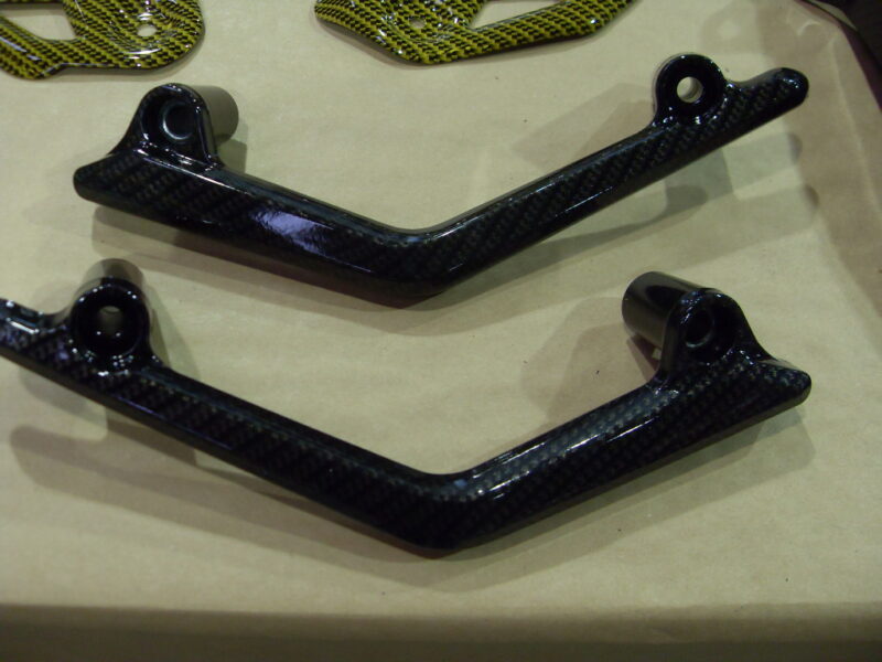 Motorbike various parts coated in carbon fibre hydrographic film painted black and yellow