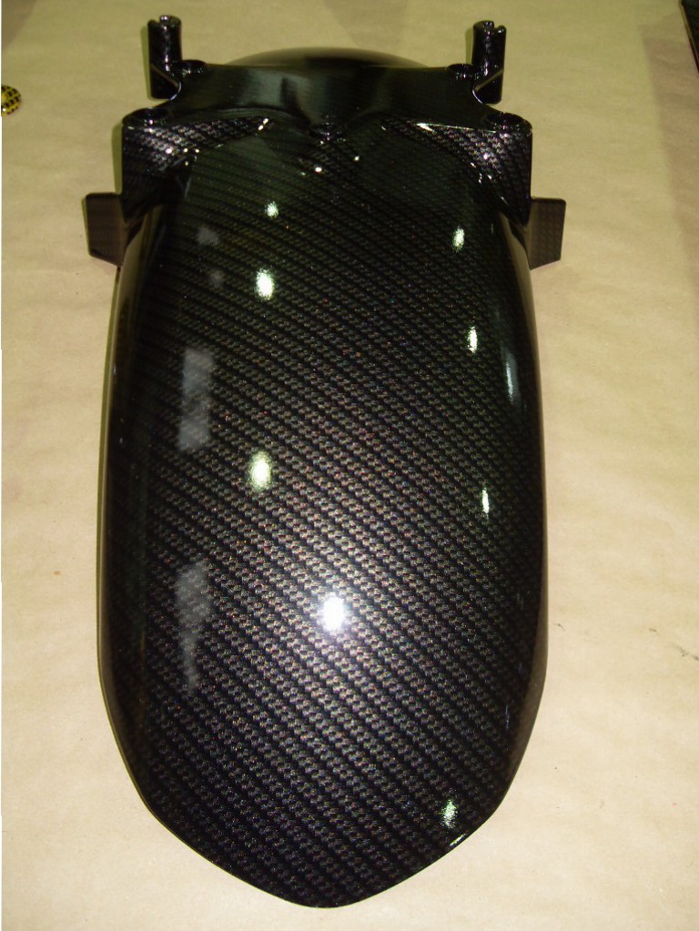 Motorbike various parts coated in carbon fibre hydrographic film painted black and yellow