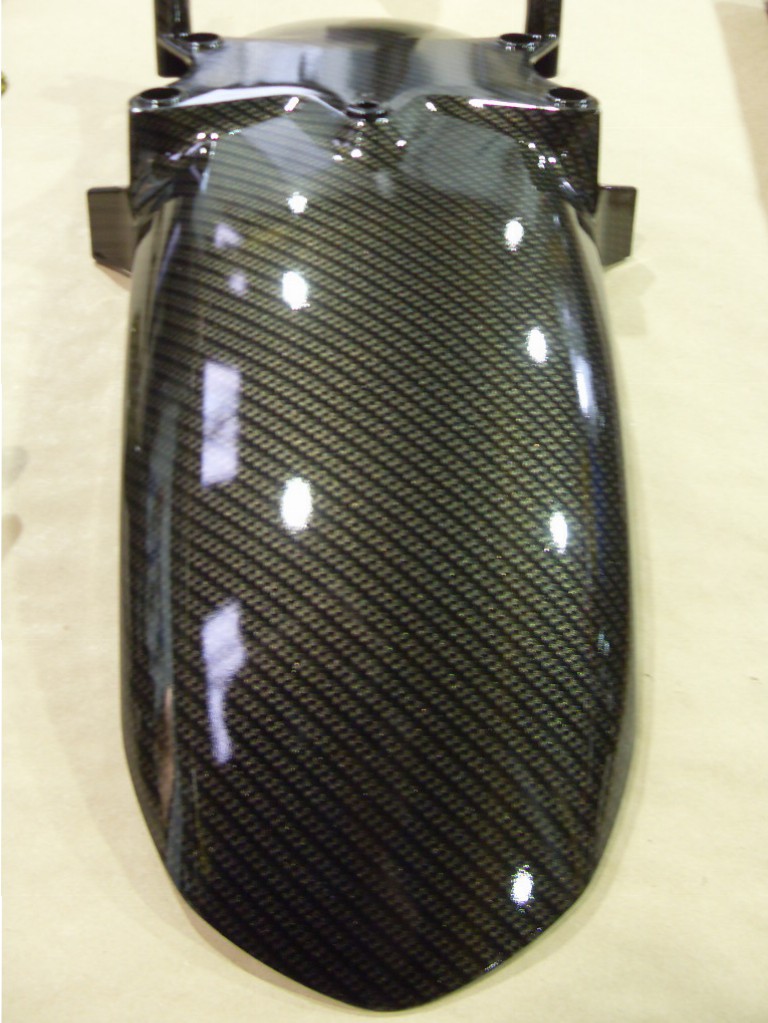 Motorbike various parts coated in carbon fibre hydrographic film painted black and yellow