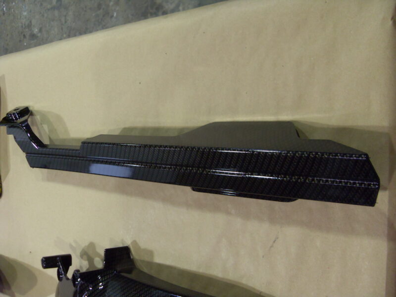 Motorbike various parts coated in carbon fibre hydrographic film painted black and yellow