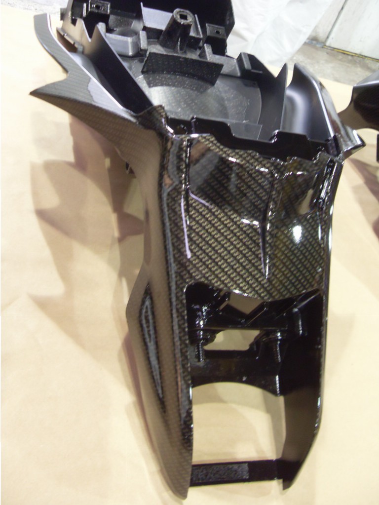 Motorbike various parts coated in carbon fibre hydrographic film painted black and yellow