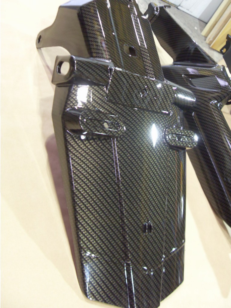 Motorbike various parts coated in carbon fibre hydrographic film painted black and yellow