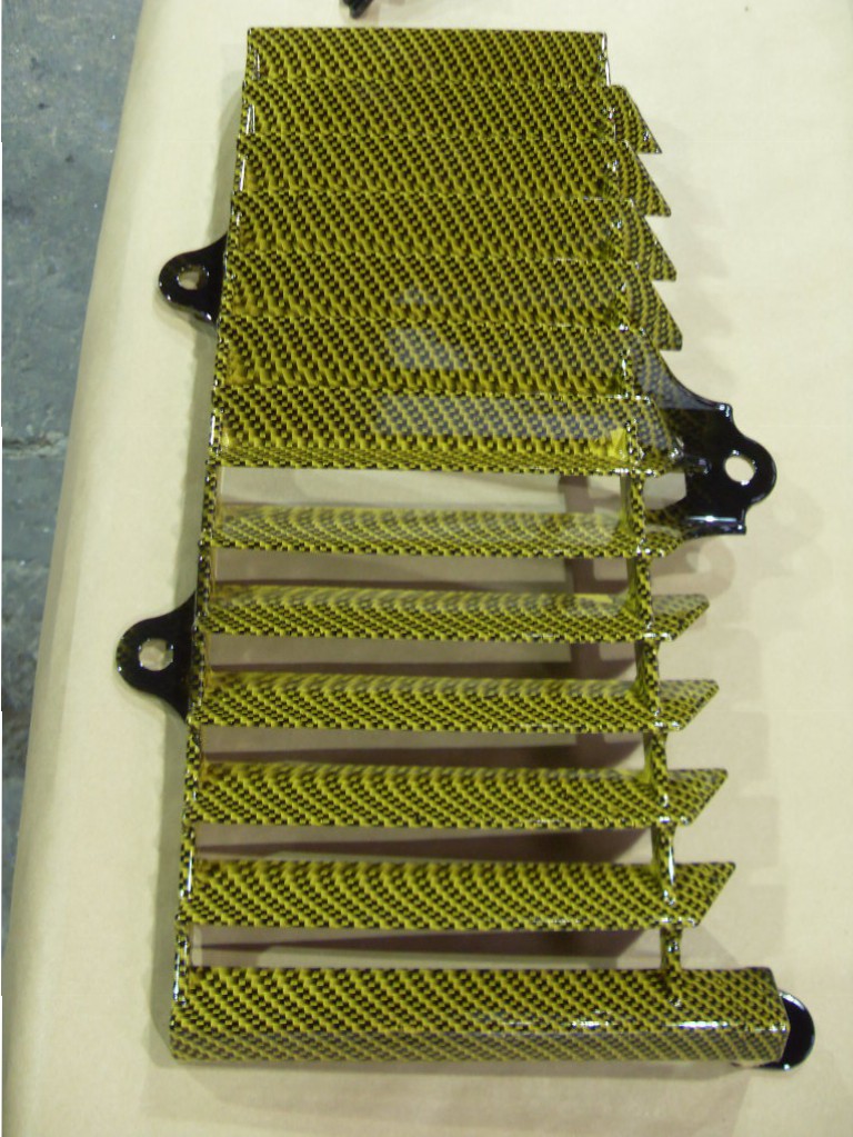 Motorbike various parts coated in carbon fibre hydrographic film painted black and yellow