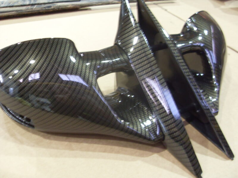 Car mirrors cover coated in carbon fibre hydrographic film painted black