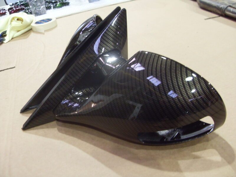 Car mirrors cover coated in carbon fibre hydrographic film painted black