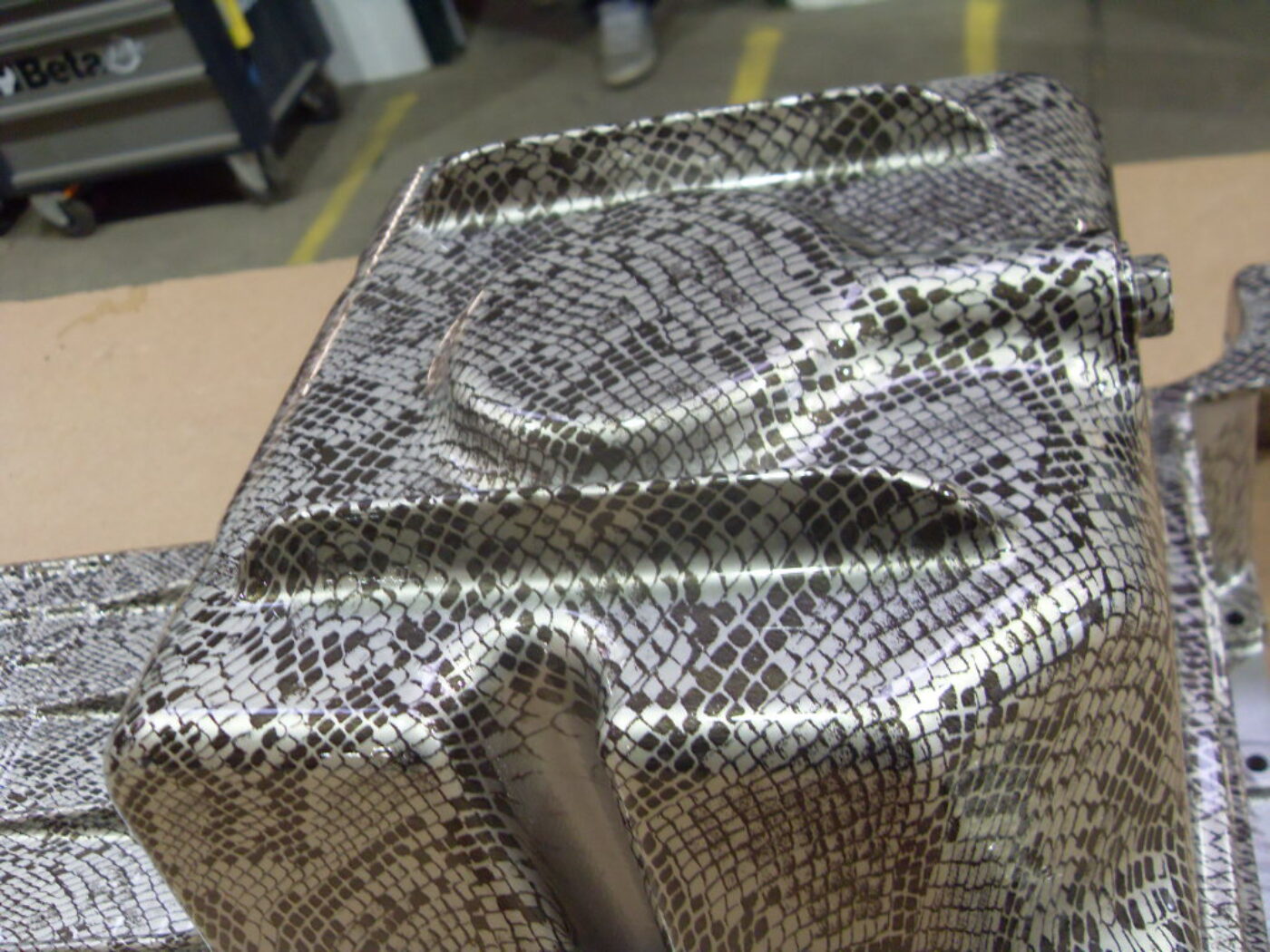 Car Engine Part Coated In Snake Hydrographic film
