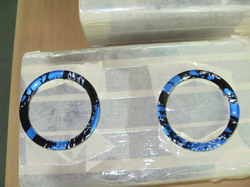 Random Items Coated In Blue Abstract Hydrographic Film.
