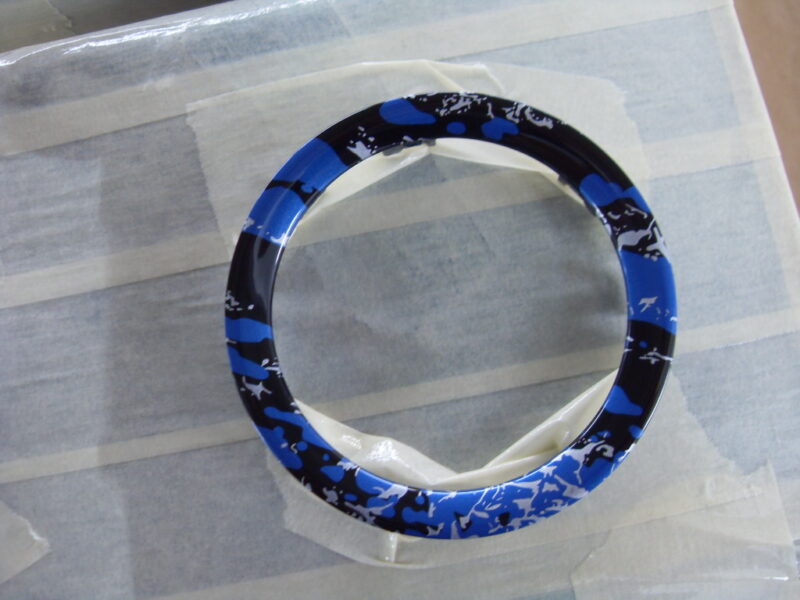 Random Items Coated In Blue Abstract Hydrographic Film.