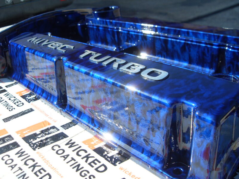 Car Engine Element Coated In Skull Hydrographic Film Painted Blue