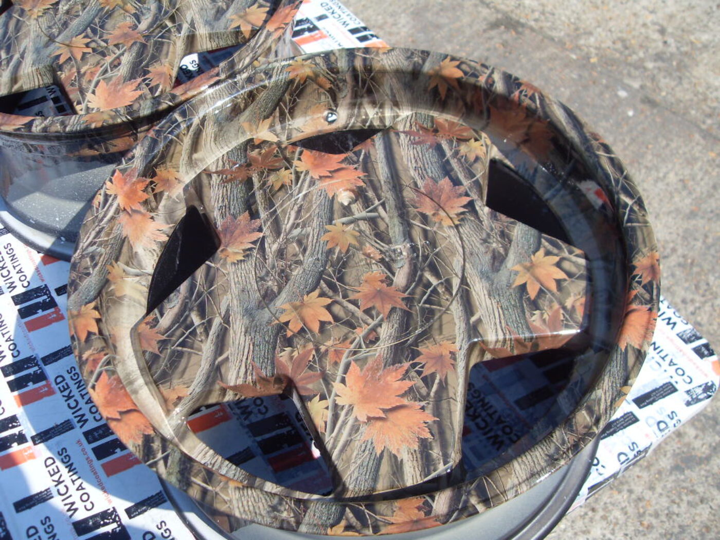 Car alloy wheels (Borbet A) coated in trees camouflage hydrographic film