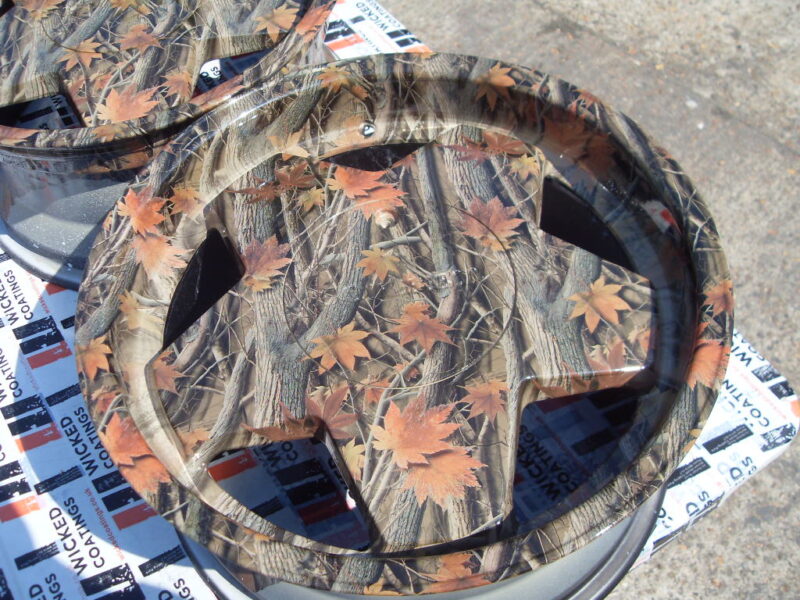Car alloy wheels (Borbet A) coated in trees camouflage hydrographic film