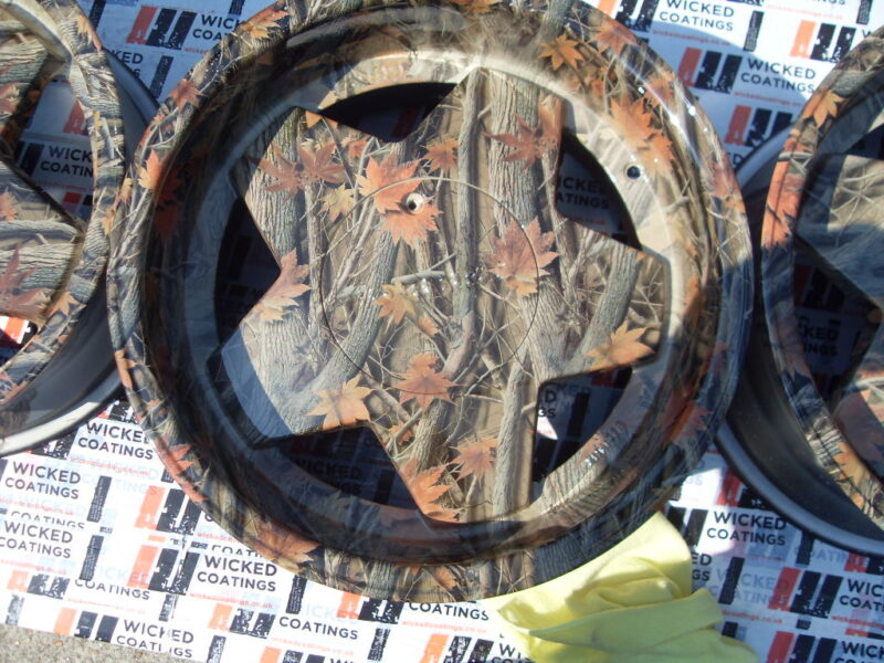 Car alloy wheels (Borbet A) coated in trees camouflage hydrographic film