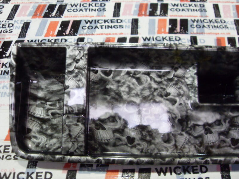 Car Dashboard Elements Coated In Skull Hydrographic Film Painted Grey