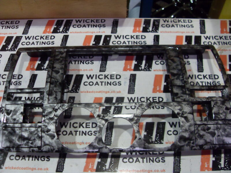 Car Dashboard Elements Coated In Skull Hydrographic Film Painted Grey