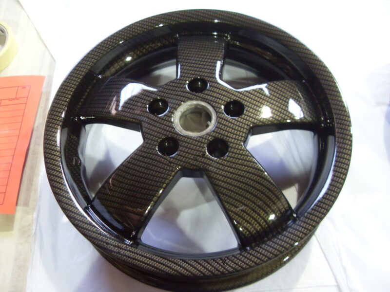Car Alloy Wheels Coated In Carbon Fibre Painted Black